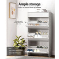 White 3-door flip shoe cabinet all doors open showing ample storage, up to 24 pairs text visible