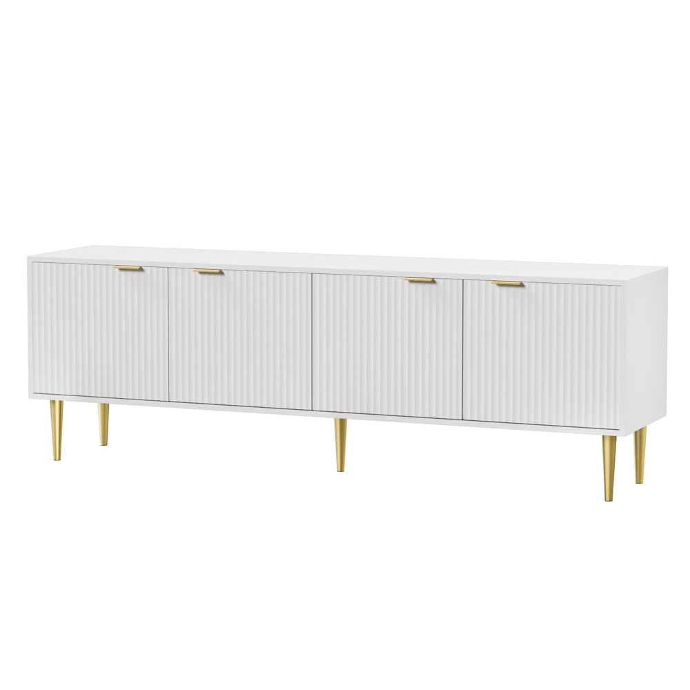 White TV unit on white background angled view 4 fluted doors gold bar handles and 6 gold tapered metal legs
