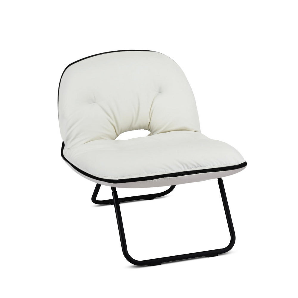 White padded foldable saucer chair with black metal frame and piped edge, in room by window, inset showing folded form