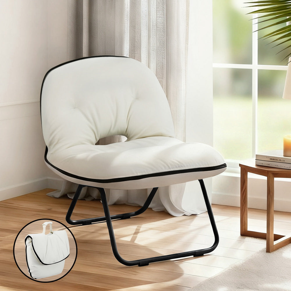 White padded foldable saucer chair with black metal frame and piped edge, in room by window, inset showing folded form
