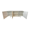 White geometric buffet front view with three doors open showing interior shelves and compartments on gold base