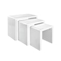 Three white high-gloss nesting tables displayed in stepped arrangement on white background, three-quarter view