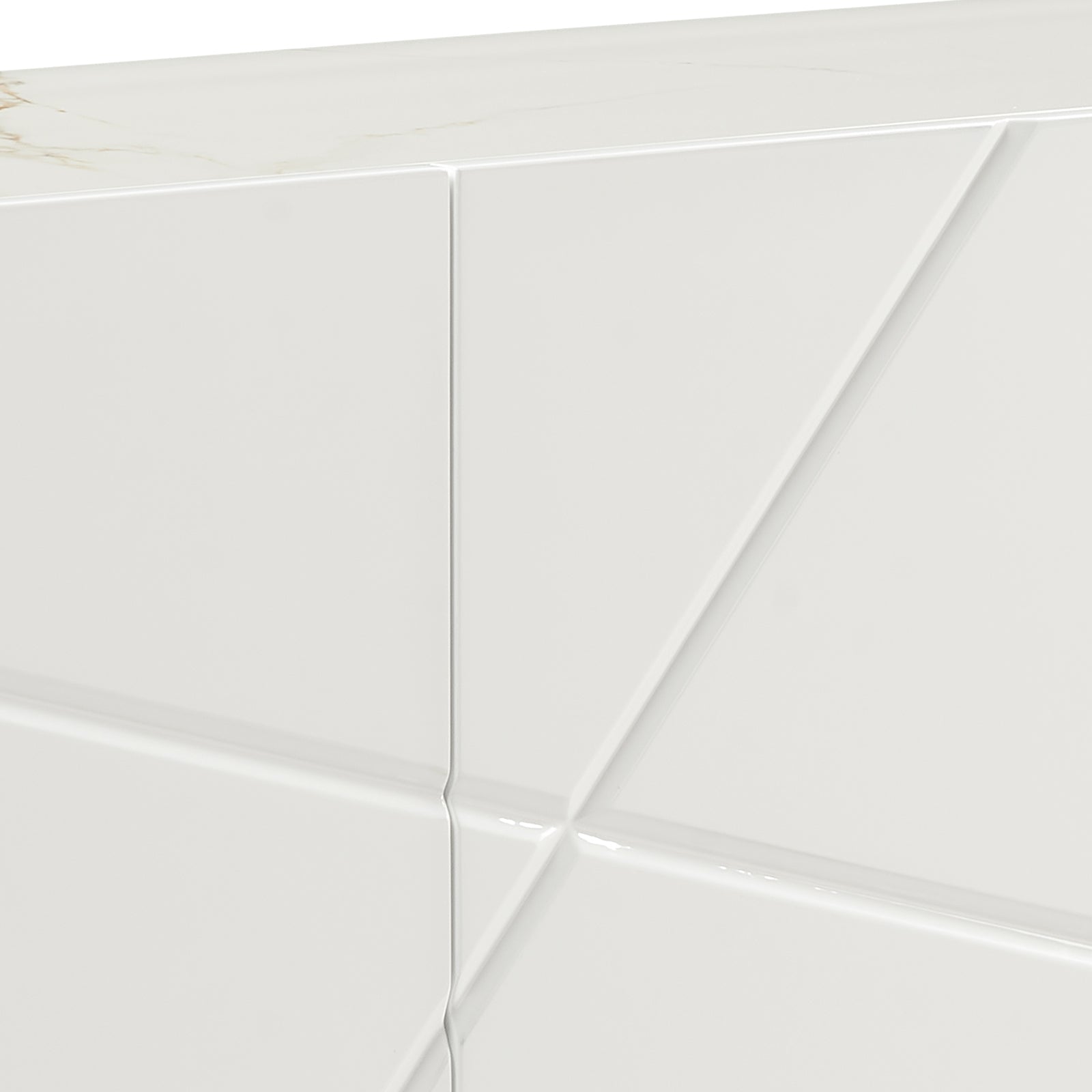 Close-up of white high-gloss sideboard showing marble-effect top and geometric angled door panel with diagonal line detail