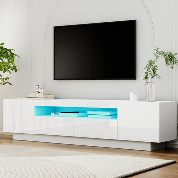 White glossy LED TV unit 180cm lifestyle in arched white room with blue LED two side doors two center drawers and plant