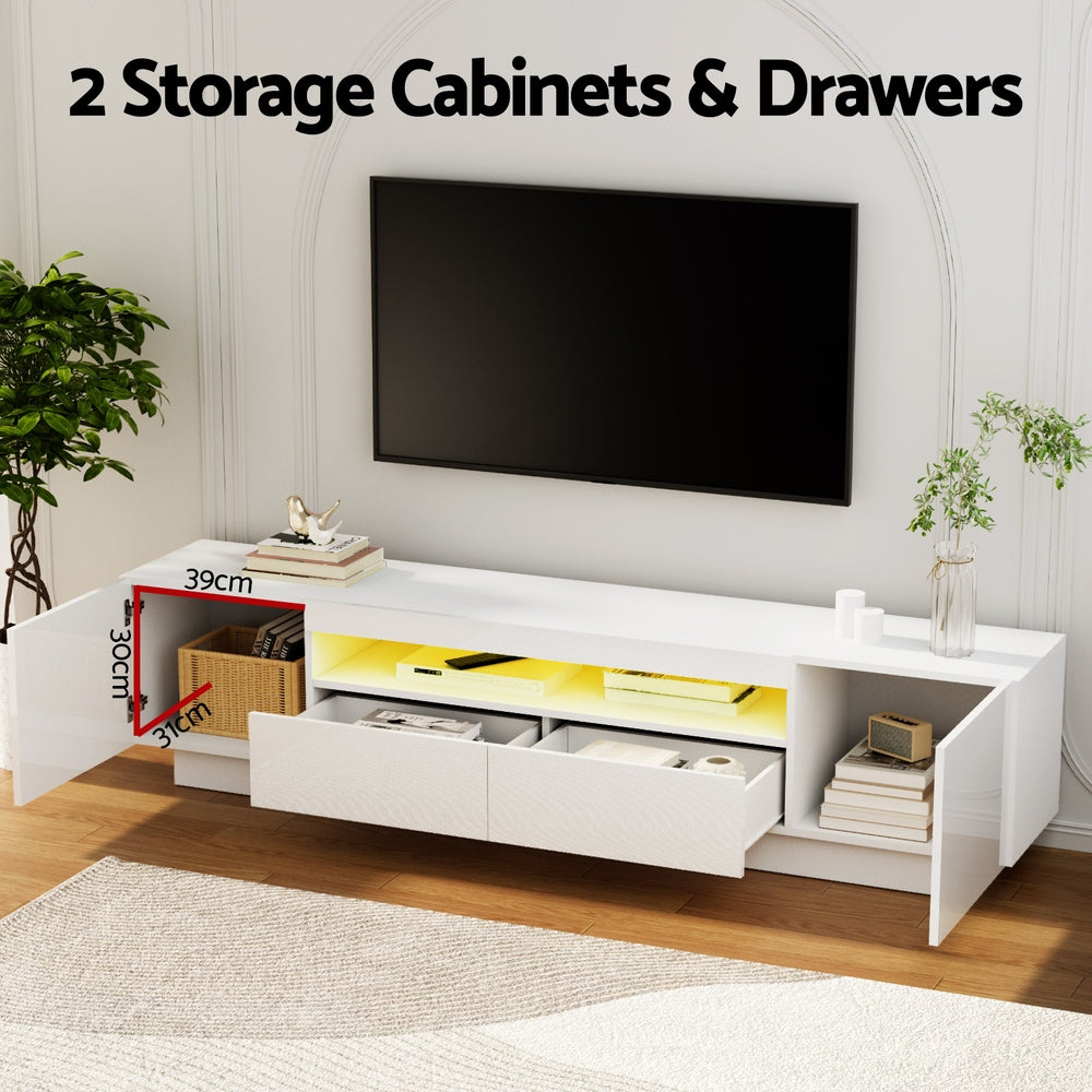 White glossy LED TV unit 180cm two drawers open 39x31cm and cabinet open with wicker basket and yellow LED in lifestyle room