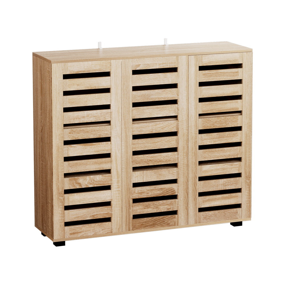 White hall tree with four double-prong coat hooks in upper section and six open shoe cubbies below