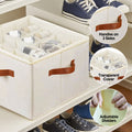 Close-up of white hall tree lower shoe bench with open cubby storage showing 100kg weight capacity label
