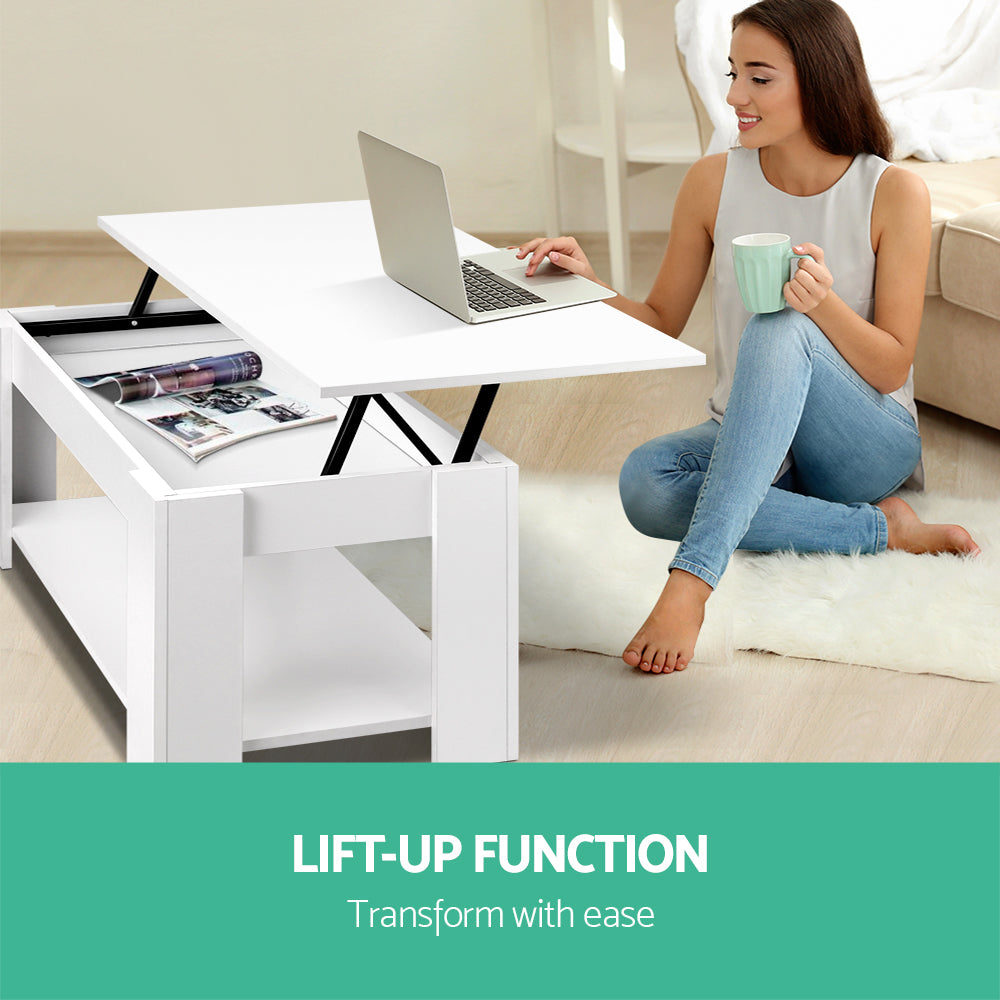 White lift-top coffee table angled three-quarter view with lower shelf visible