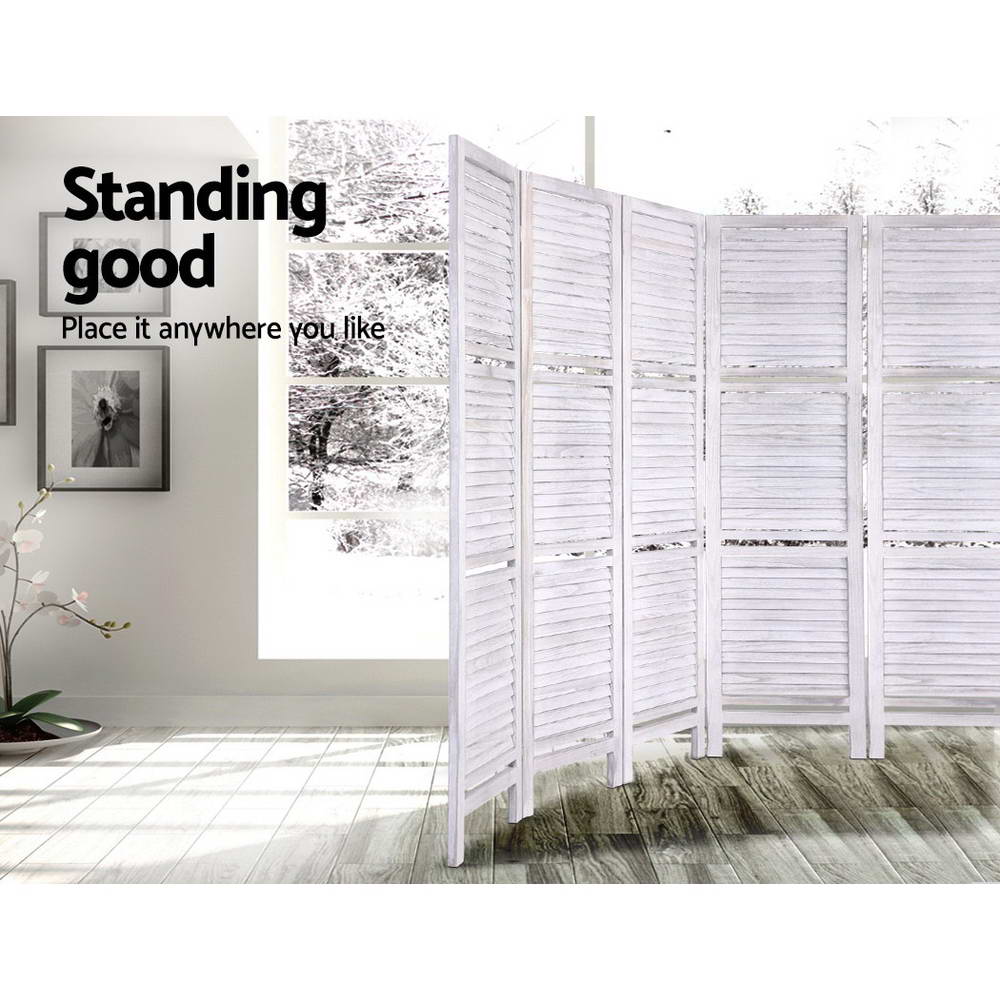 White louvered wood room divider 170cm height infographic in lifestyle room with framed wall photos and orchid plant