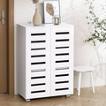 White louvred 2-door shoe cabinet in hallway with vase and art print on top and white stool beside