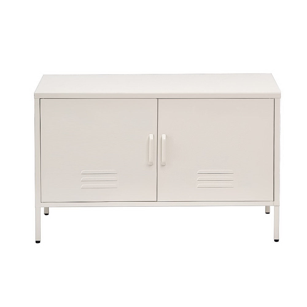 White metal two-door locker cabinet with centre handles and vent slots on base frame in room with white floor lamp