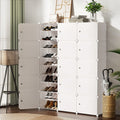 White modular cube shoe cabinet with left section open showing shoes and right section closed in hallway with lamp and art