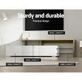 White TV unit features infographic showing precise drawer gap anti-rust runners and anti-slip base details