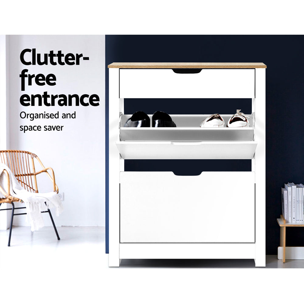 White oak top shoe cabinet upper tray open with black and white shoes clutter-free entrance text blue wall rattan chair