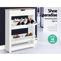 White oak top shoe cabinet both flip-out trays open loaded with shoes shoe paradise up to 16 pairs badge in lifestyle