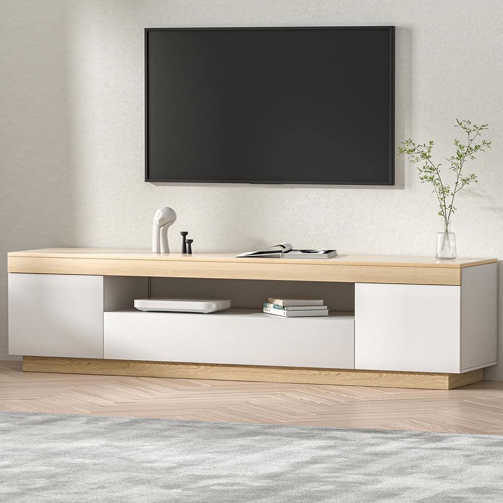 White and oak 180cm TV unit in living room with wall TV and drawer pulled open showing glass shelf