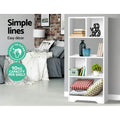 White asymmetric open bookcase in living room with books and cushions; badges show easy to clean and 10kg capacity per shelf