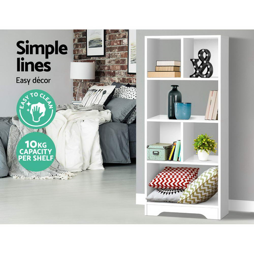 White asymmetric open bookcase in living room with books and cushions; badges show easy to clean and 10kg capacity per shelf