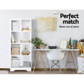 White asymmetric open bookcase with books and plants in home office lifestyle scene; text overlay reads Perfect match