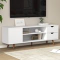 White Scandi TV unit with pine legs in room with headphones radio and books on open center shelves