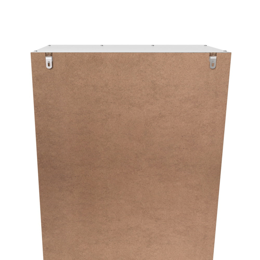 Rear view of white shoe cabinet showing MDF back panel and keyhole wall bracket slots