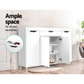 White shoe cabinet right door open showing shelves with candles and books ample space text inset of drawer with sunglasses