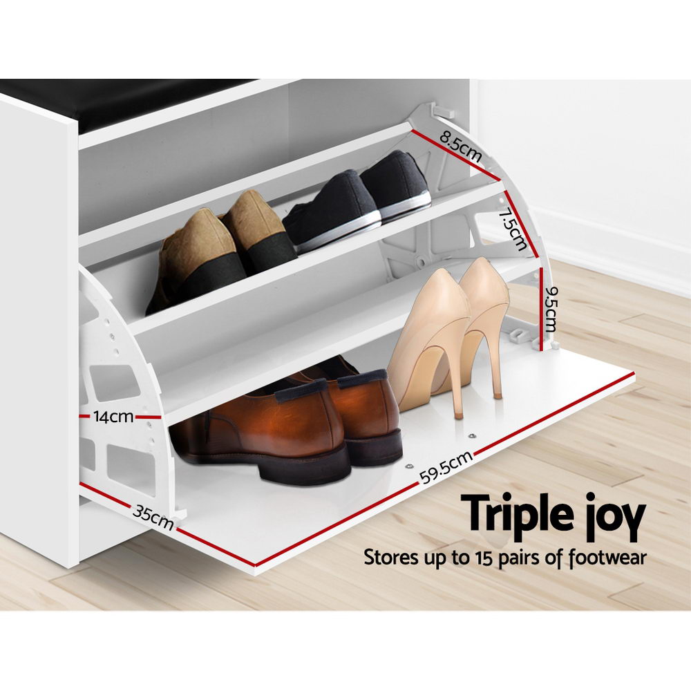 White shoe storage bench close-up of three tilting shelves loaded with heels and loafers shelf spacings annotated