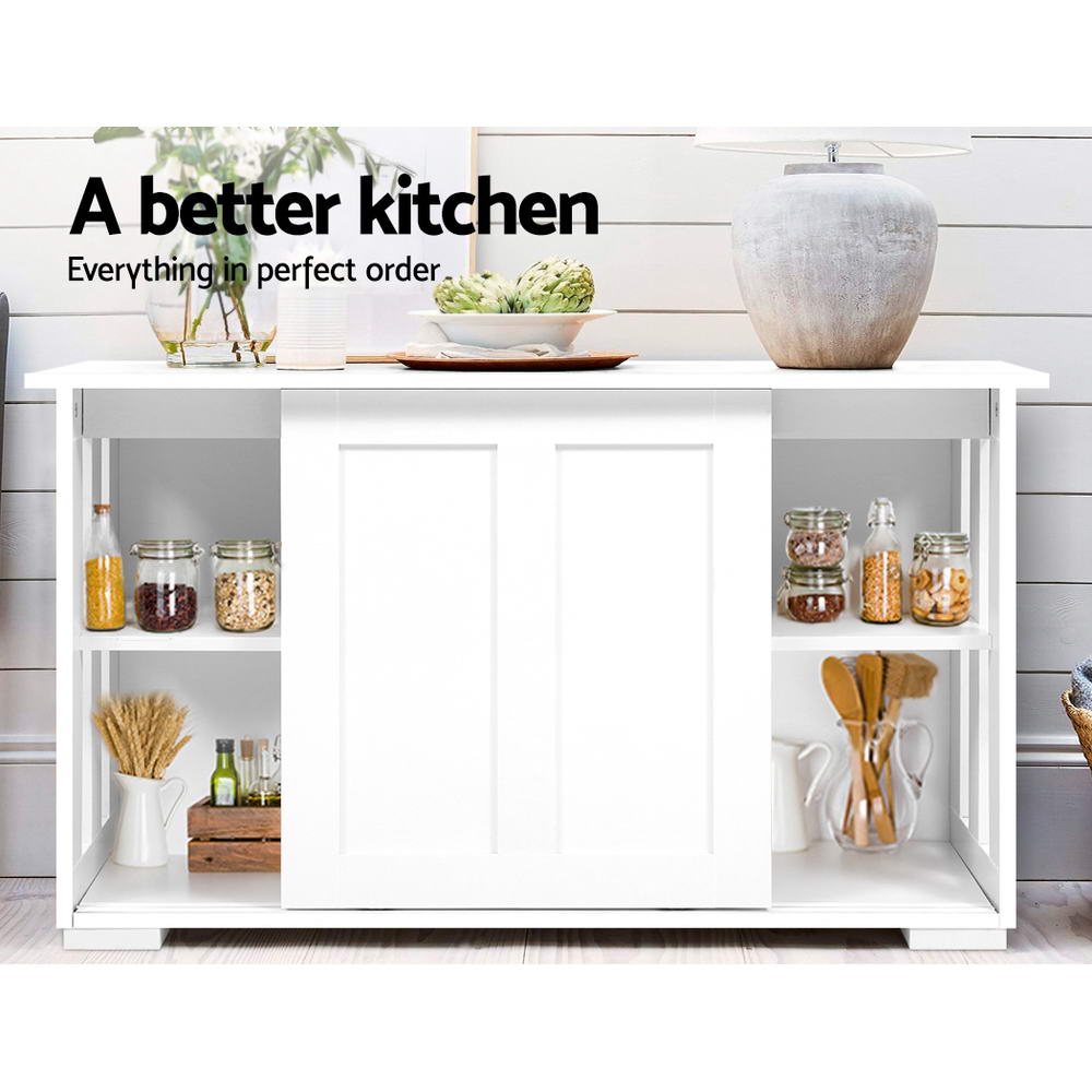 White sideboard with open shelves storing jars in kitchen; text: a better kitchen, everything in perfect order