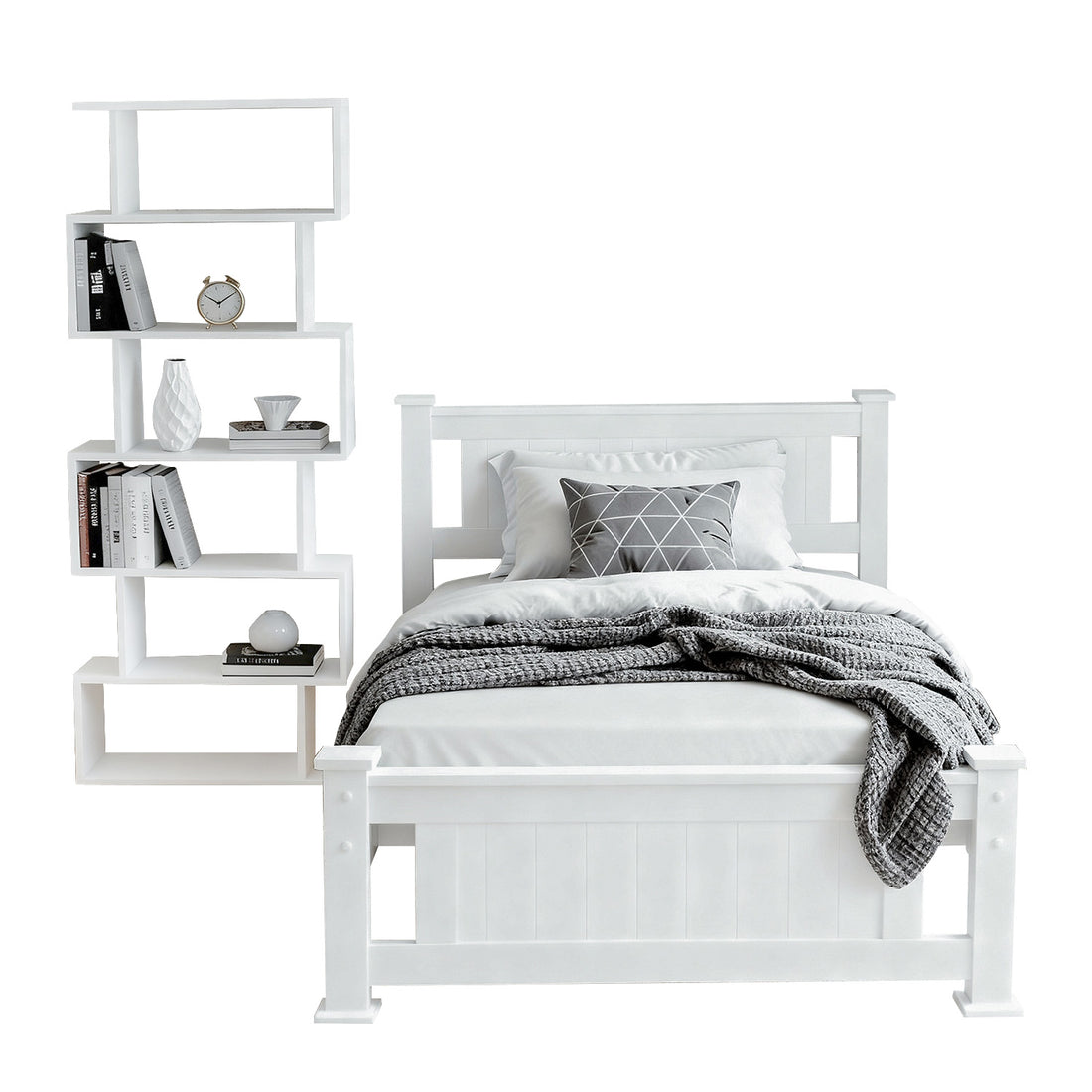 White single bed frame with panel headboard and footboard beside white zigzag bookshelf, on white background