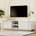 White TV unit 160cm sliding Shaker-panel doors in cream arched room with wall-mounted TV plant vase and bird ornament