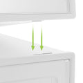 Close-up of white stackable shoe boxes showing stacking mechanism with green arrow indicators