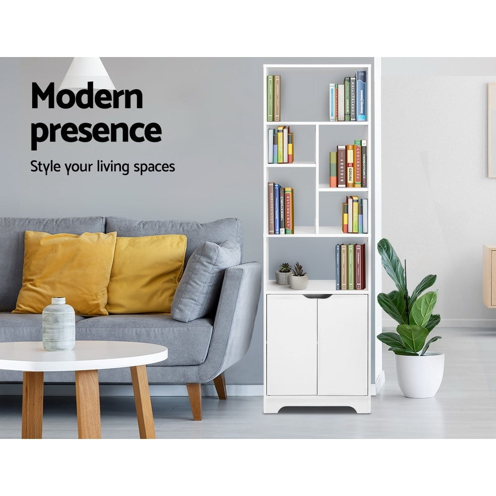 White tall bookcase filled with books in grey living room, text reads Modern presence Style your living spaces