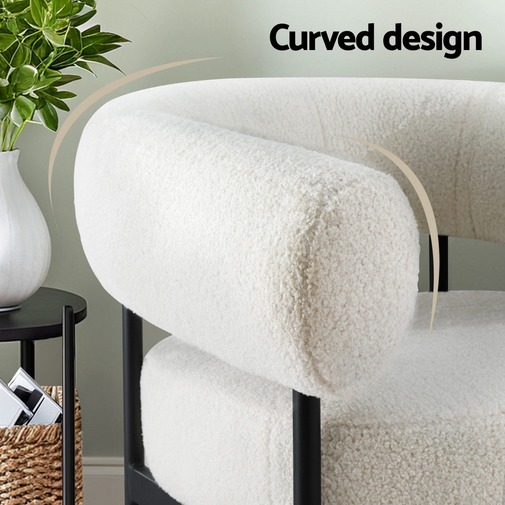 Close-up of white teddy barrel armchair curved tubular armrest with Curved design text overlay in lifestyle room