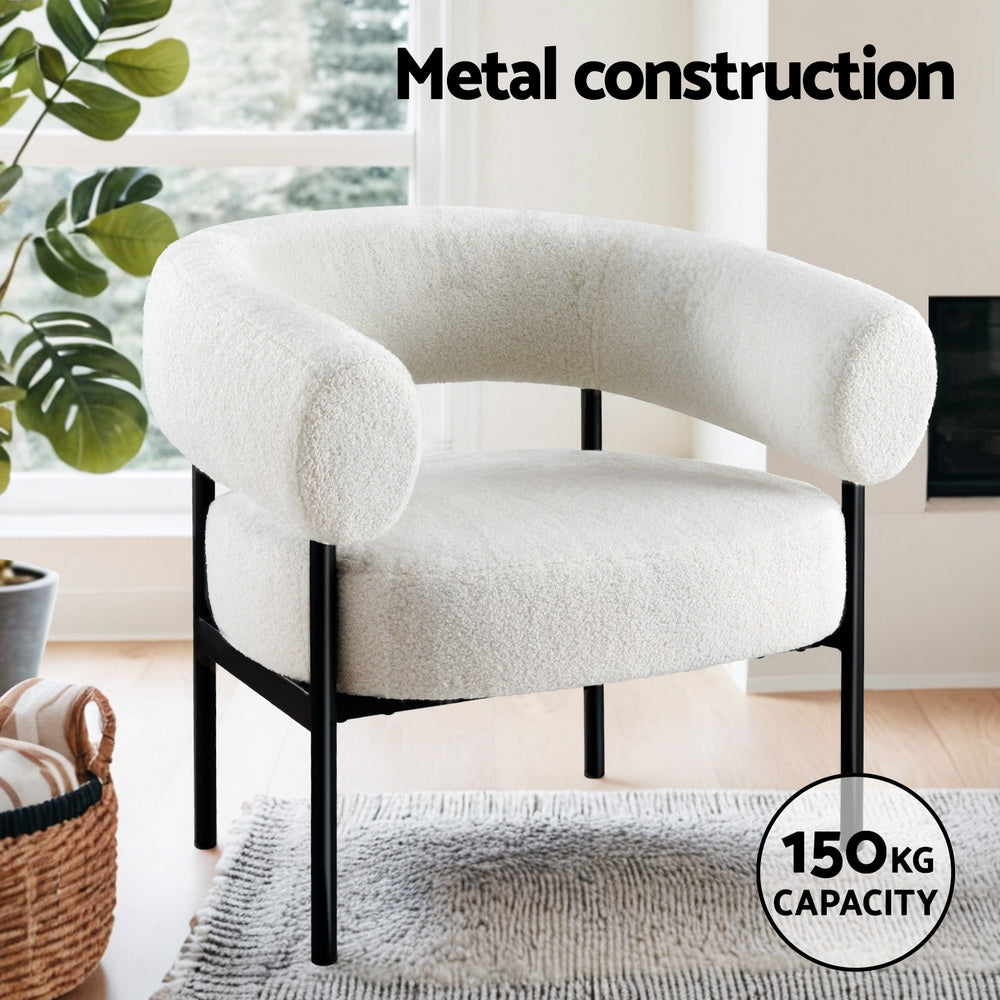 White teddy barrel armchair on black metal frame in lifestyle room with 150kg capacity badge and Metal construction text