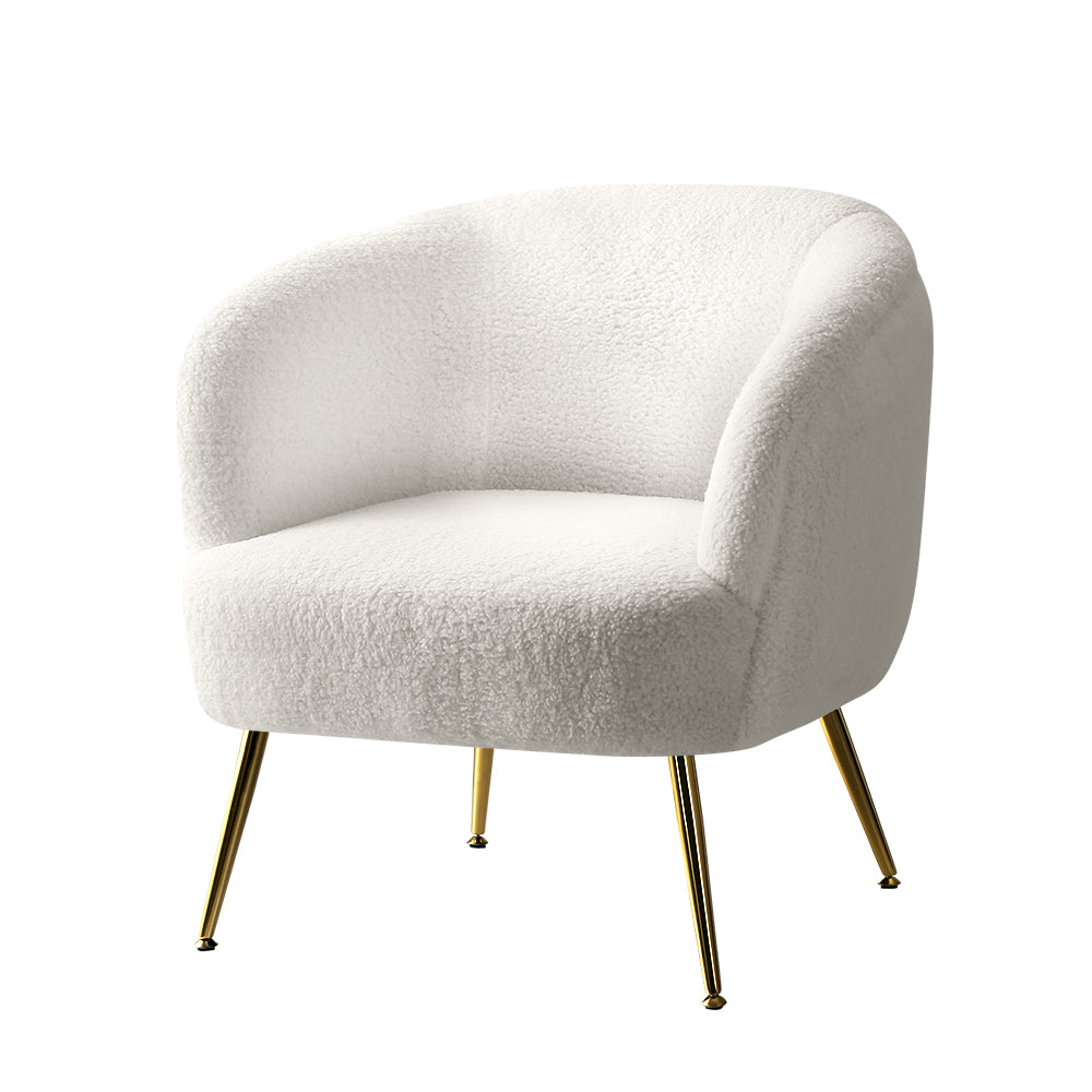 White teddy fabric barrel armchair with curved backrest and splayed gold metal legs angle view on white background