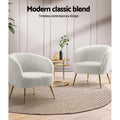Pair of white teddy fabric barrel armchairs with gold legs in lounge scene with gold side table and Modern classic blend text