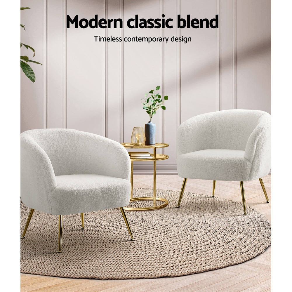 Pair of white teddy fabric barrel armchairs with gold legs in lounge scene with gold side table and Modern classic blend text