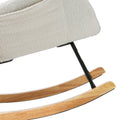 Close-up of white teddy rocking chair showing natural wood curved rocker runners and black metal frame legs