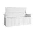 White timber outdoor storage bench with lid fully open, interior visible, three-quarter view on white background