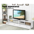White TV unit 180cm neat appearance lifestyle in room with Panasonic TV beach scene disc player and books