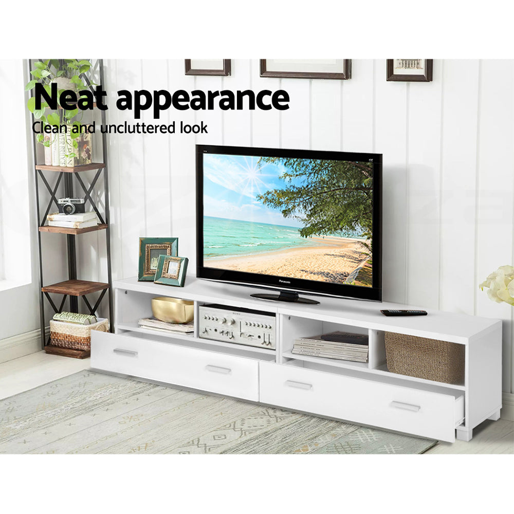 White TV unit 180cm neat appearance lifestyle in room with Panasonic TV beach scene disc player and books