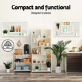 Two white wall display shelves in kitchen lifestyle setting with kitchenware, text Compact and functional, 20kg max capacity