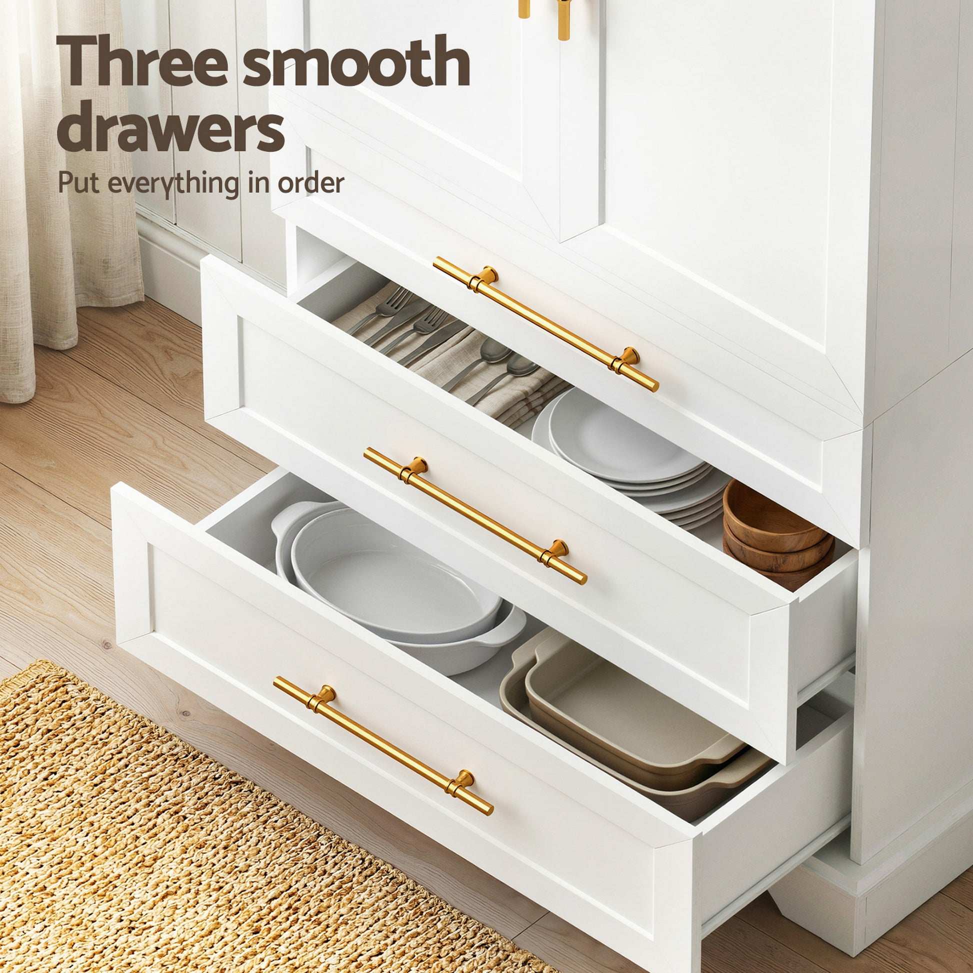 Three open drawers of white pantry cabinet with gold handles showing dishes, text reads Three smooth drawers