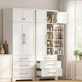 Two white pantry cabinets in kitchen corner with right unit open showing pantry storage and two drawers extended