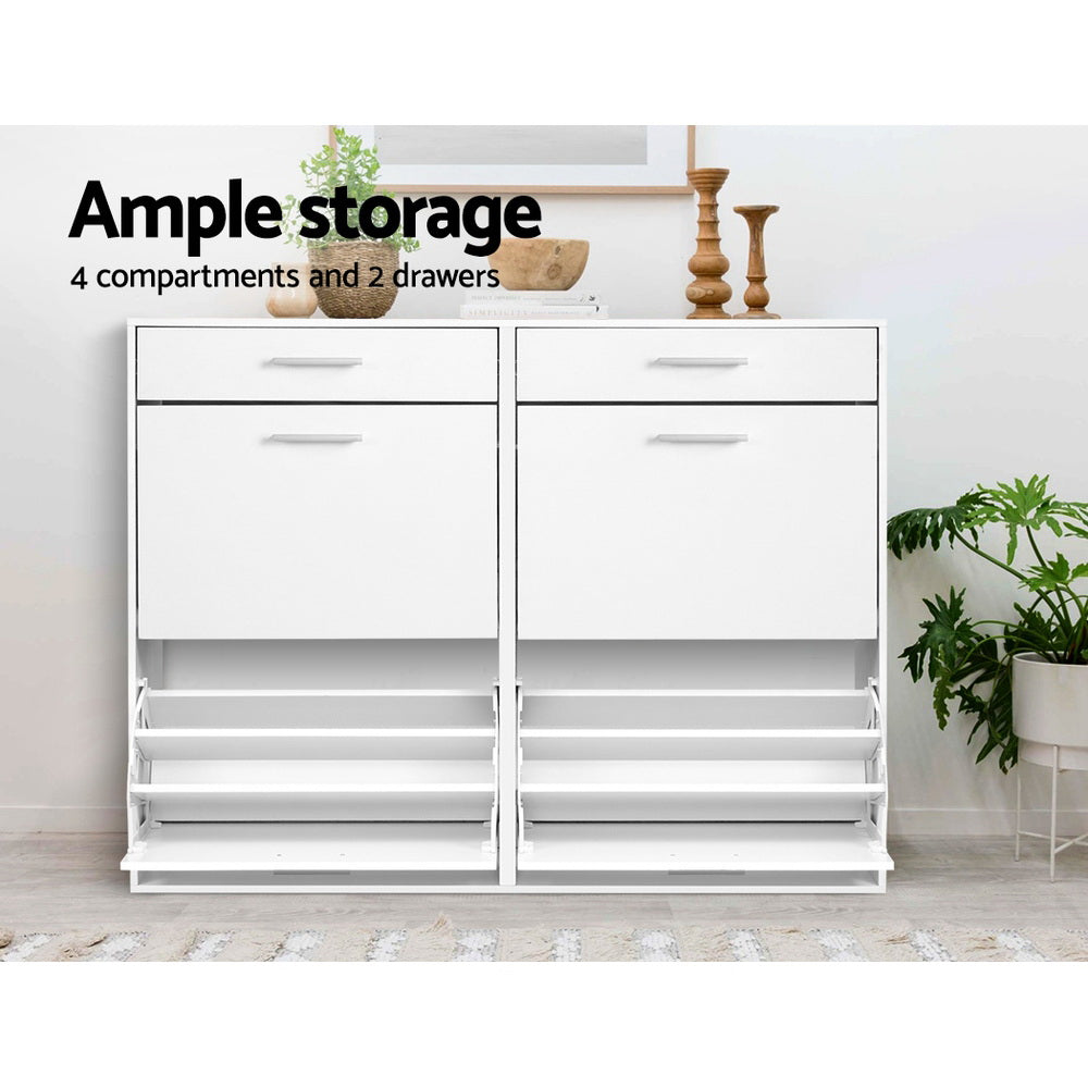 Two white wide shoe cabinets side by side lower trays open ample storage 4 compartments and 2 drawers text with plant decor