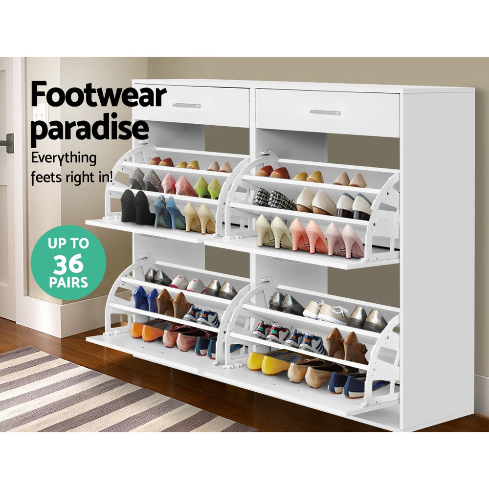 White wide shoe cabinet all four flip-out trays open loaded with heels and sneakers footwear paradise up to 36 pairs badge