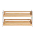Two-tier shoe rack with white MDF side panels and natural wood slatted shelves, empty, front view