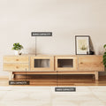 Natural wood TV unit in room setting with capacity labels 80kg top surface 5kg drawers 10kg cabinet