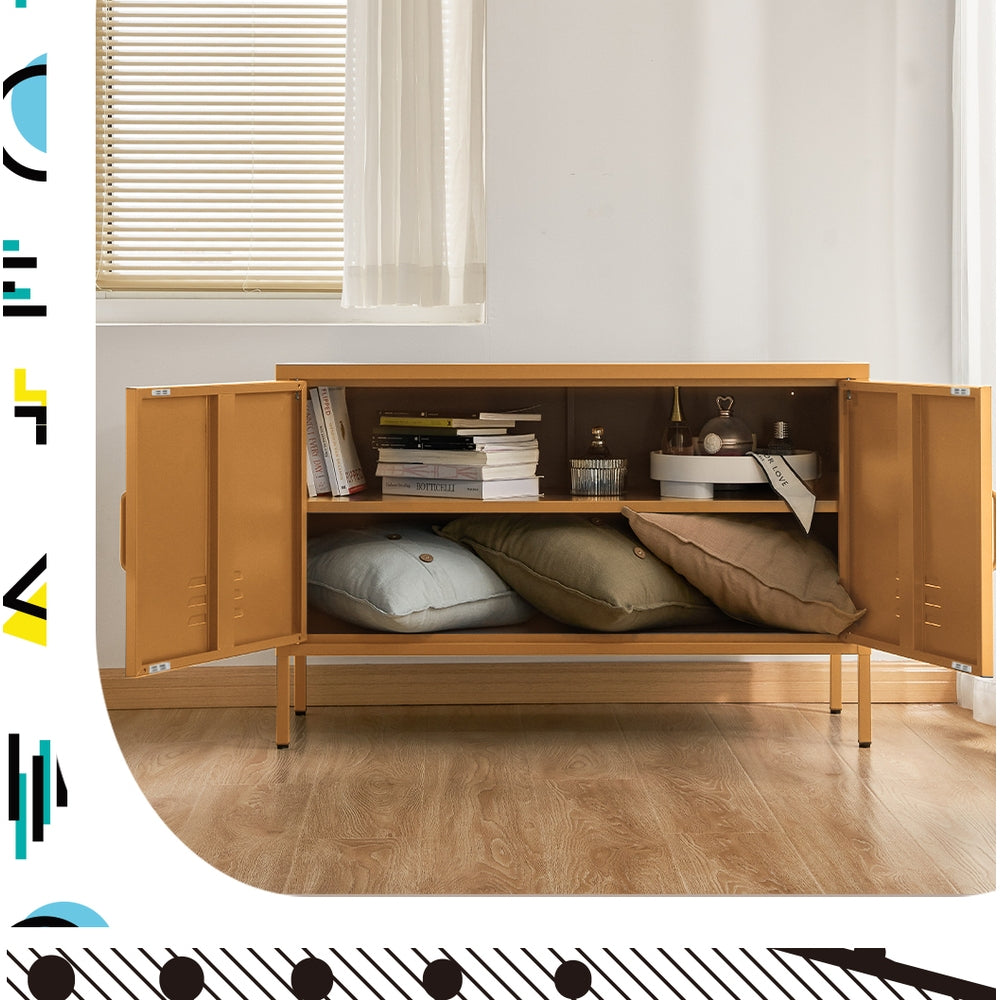 Mustard yellow two-door sideboard cabinet open in room showing books and decor on top shelf, cushions below