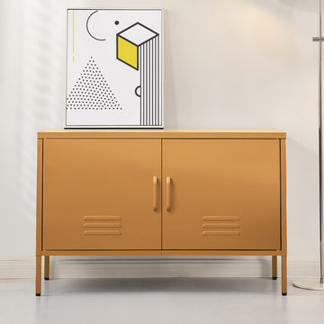 Mustard yellow two-door metal sideboard cabinet with louvre vents on grey floor, abstract art print on top